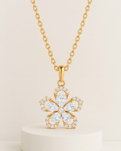 Damen Halskette Silber 925 vergoldet Anhänger Kristall Blumenkette 'Linea', filigrane Silberkette goldener Blumenanhänger klein, drehende Kette Blume