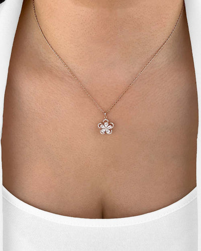 Damen Halskette Silber 925 vergoldet Anhänger Kristall Blumenkette 'Linea', filigrane Silberkette goldener Blumenanhänger klein, drehende Kette Blume